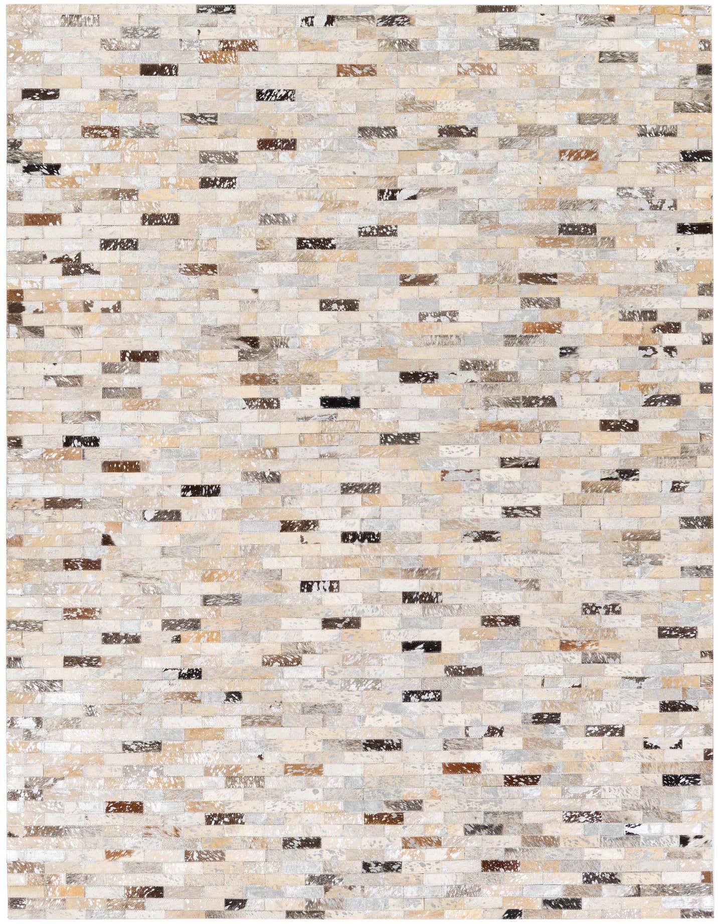 A 5x7 rectangular multi-colored modern cowhide rug with a patchwork design, featuring varying shades of beige, brown, grey, and black rectangular patches.