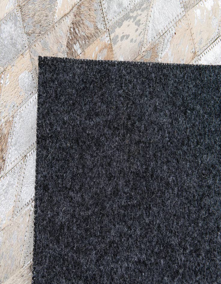 Detail image of  4' 6 x 6' 6 Cowhide Stocks Rug