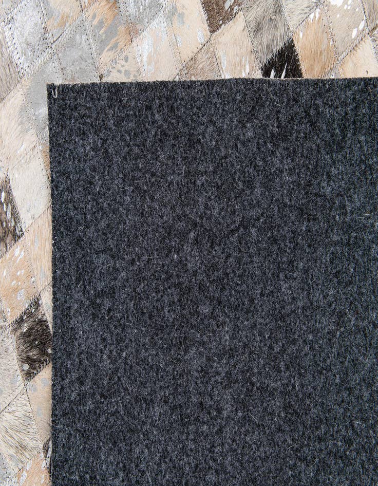 Detail image of  4' x 5' 7 Cowhide Stocks Rug