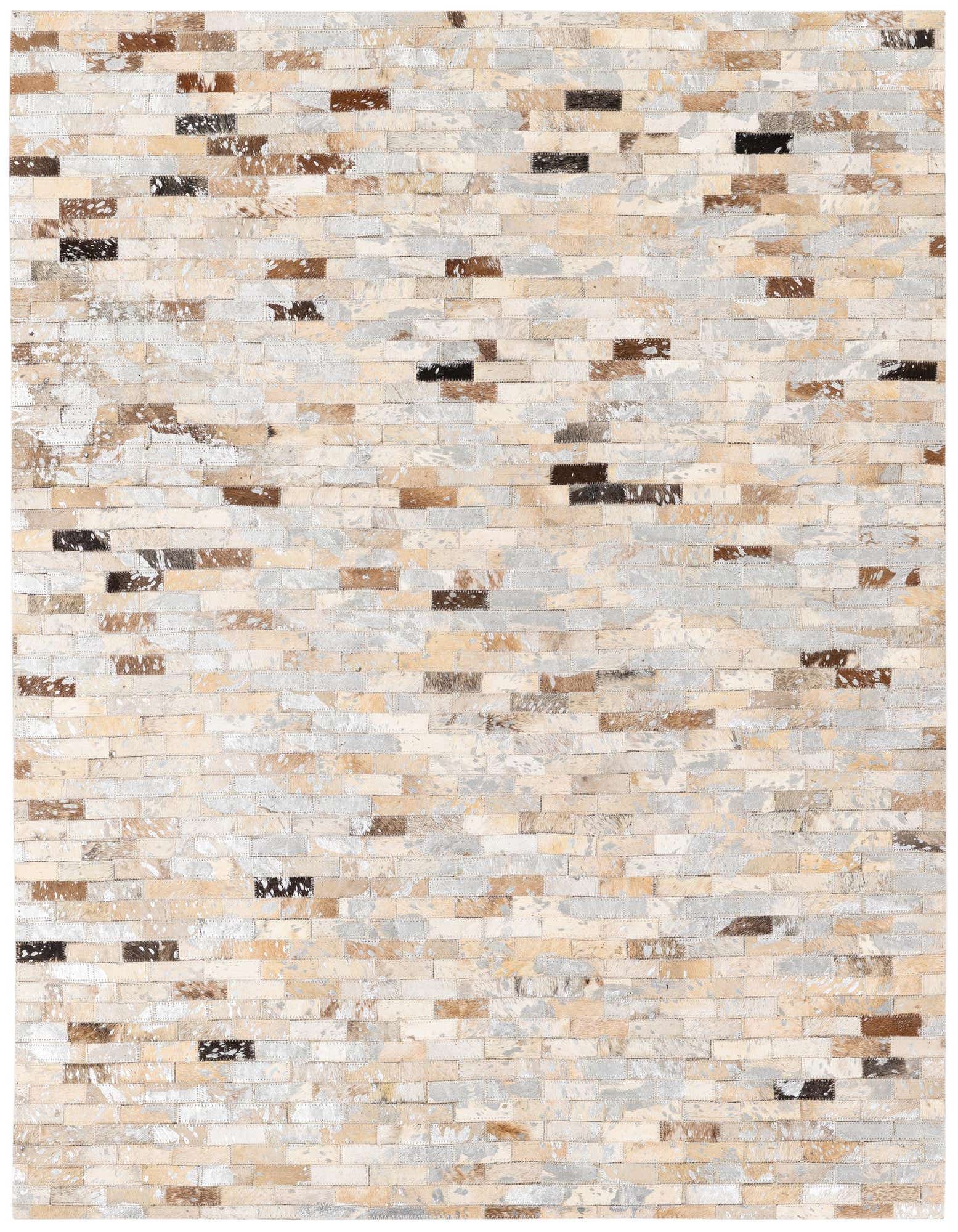 A rectangular 4x6 multi-colored cowhide rug featuring a patchwork of natural brown, black, cream, and grey leather pieces.