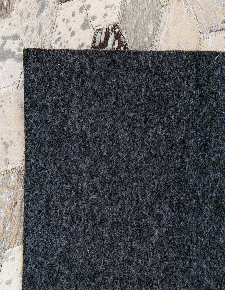 Detail image of  4' x 5' 7 Cowhide Stocks Rug