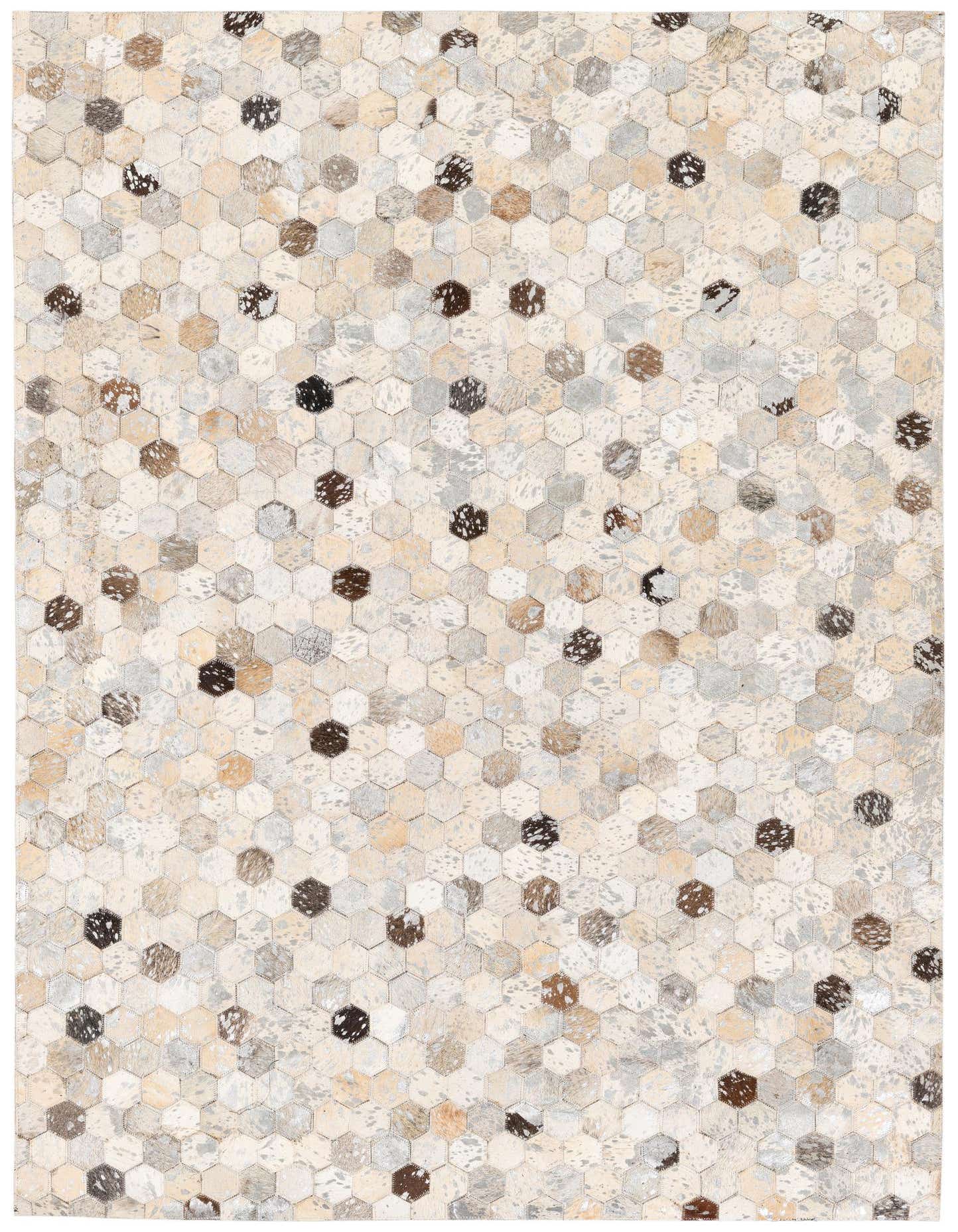 A 4x6 rectangular multi-colored cowhide rug featuring a modern hexagonal patchwork design, ideal for a living room.