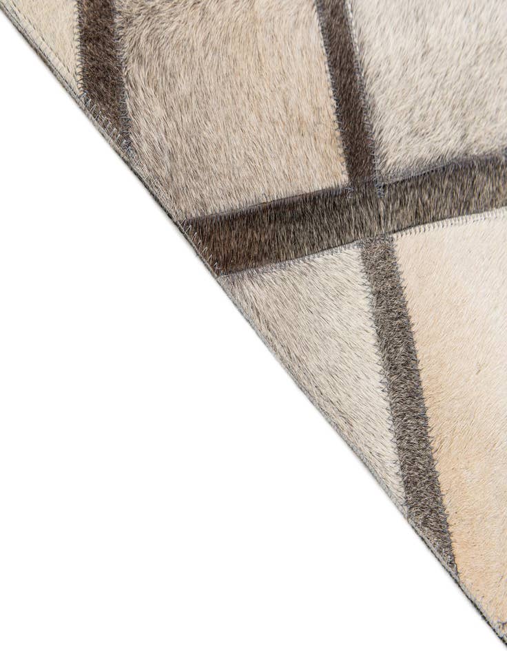 Detail image of  4' 1 x 6' 3 Cowhide Stocks Rug
