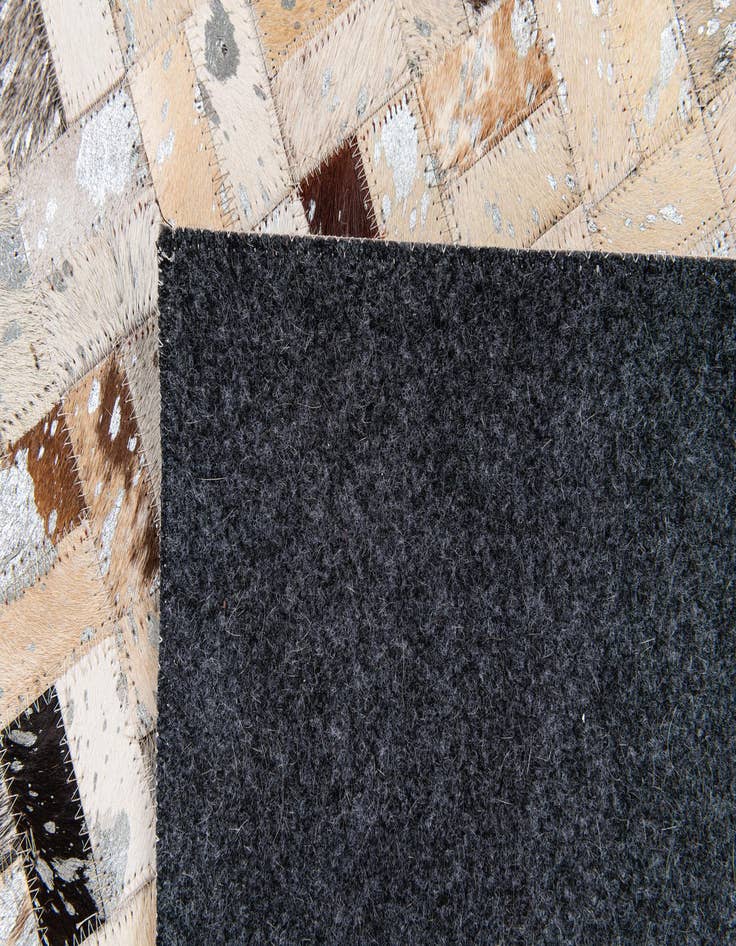 Detail image of  4' 1 x 5' 10 Cowhide Stocks Rug