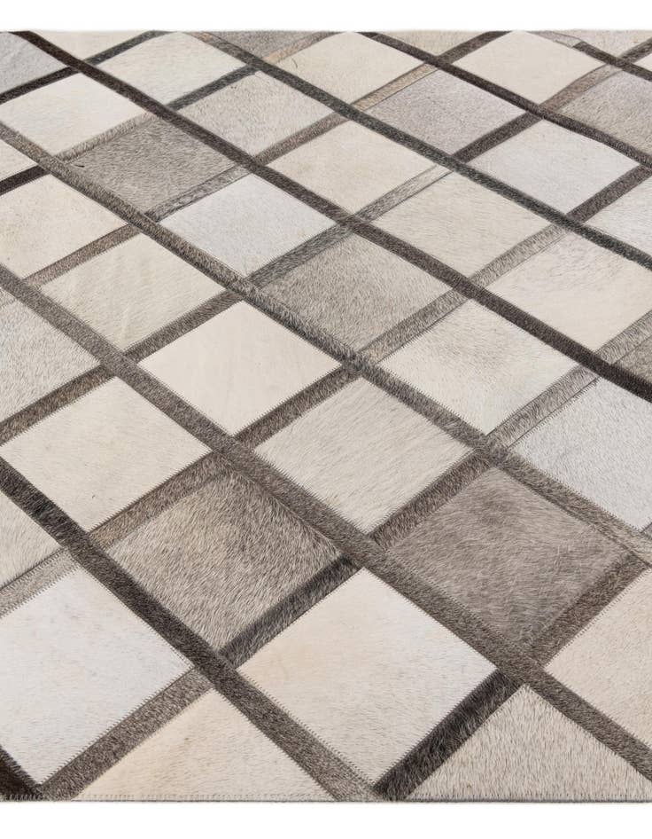 Detail image of  4' 1 x 6' 1 Cowhide Stocks Rug