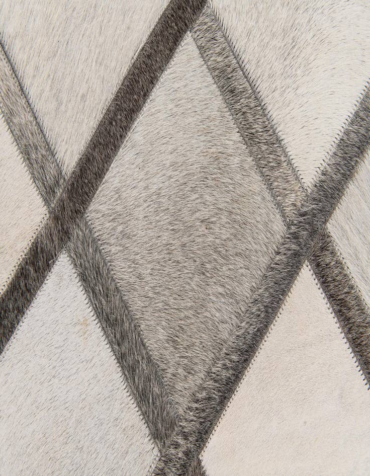 Detail image of  4' 1 x 6' 1 Cowhide Stocks Rug