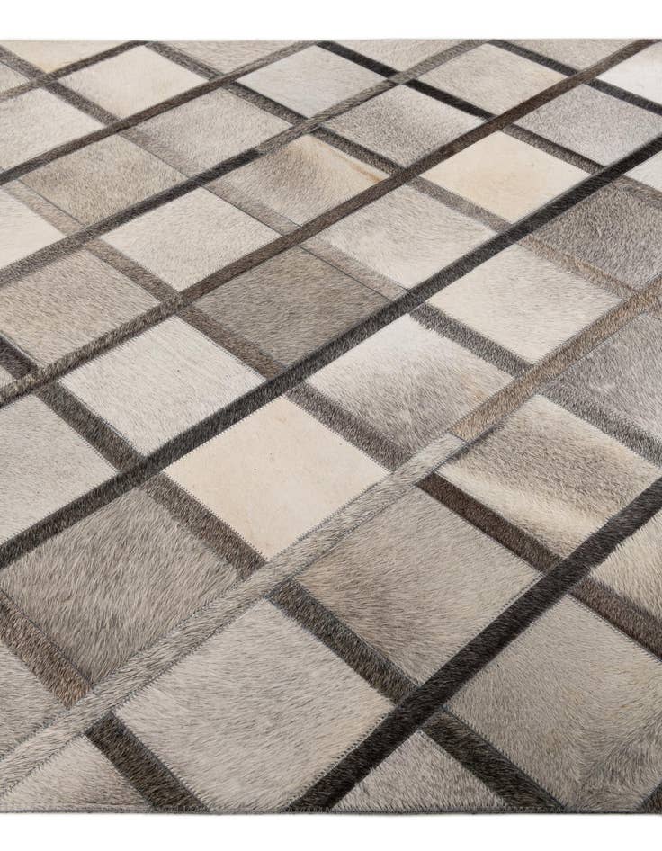 Detail image of  4' 1 x 6' 3 Cowhide Stocks Rug