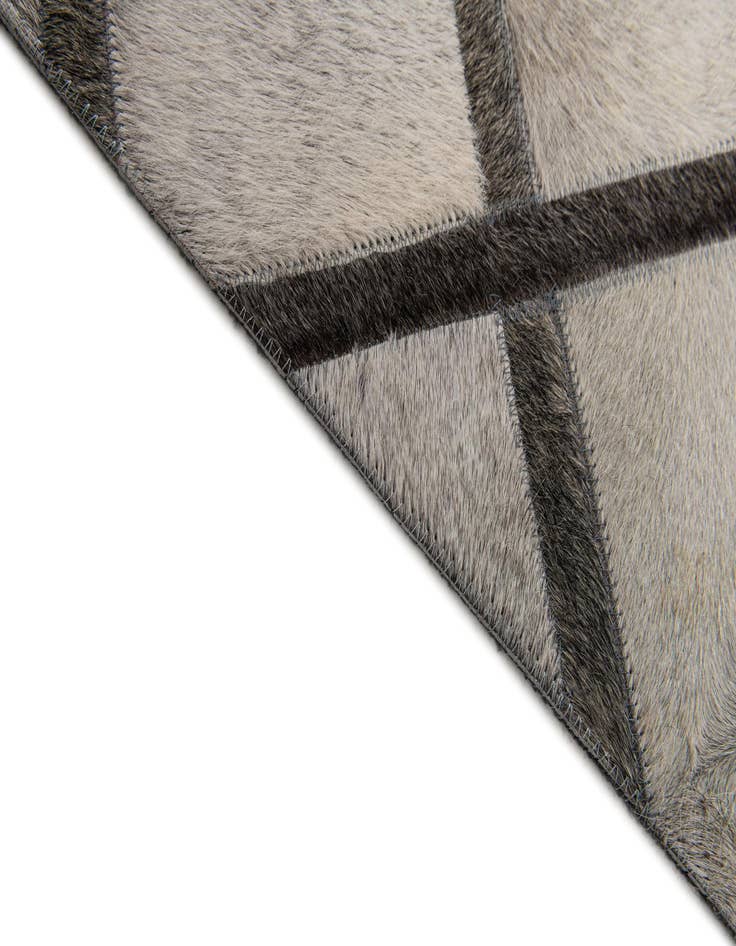 Detail image of  4' 1 x 6' 3 Cowhide Stocks Rug