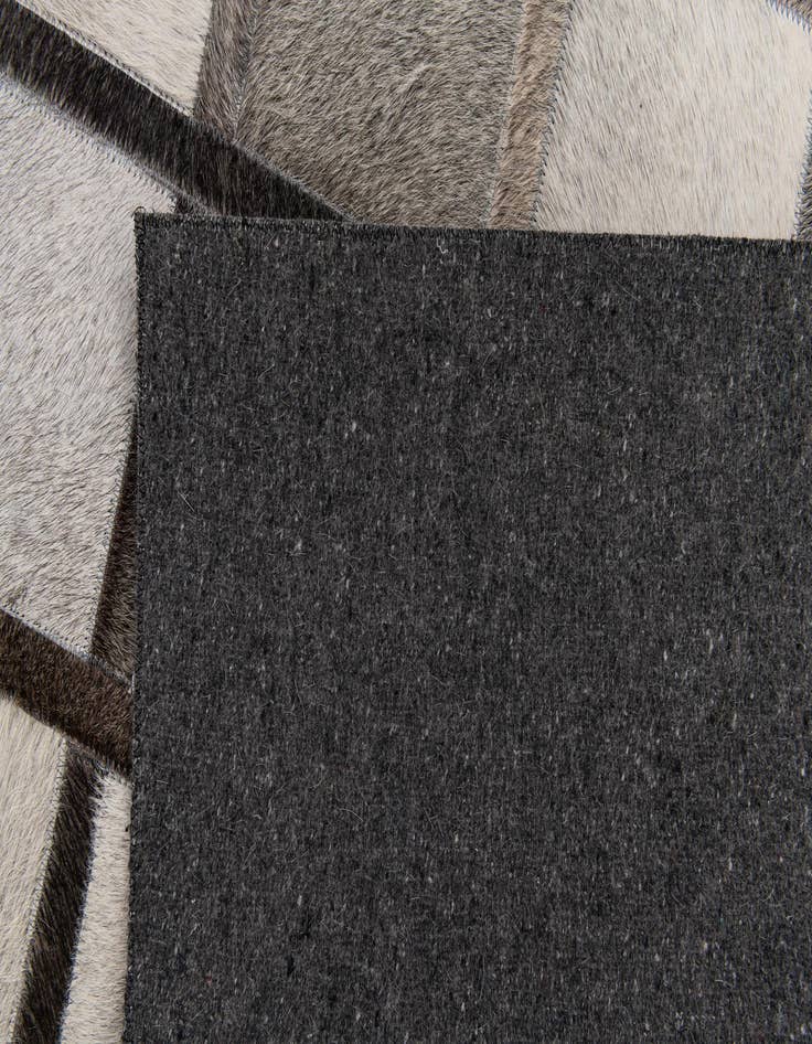 Detail image of  4' 1 x 6' 3 Cowhide Stocks Rug