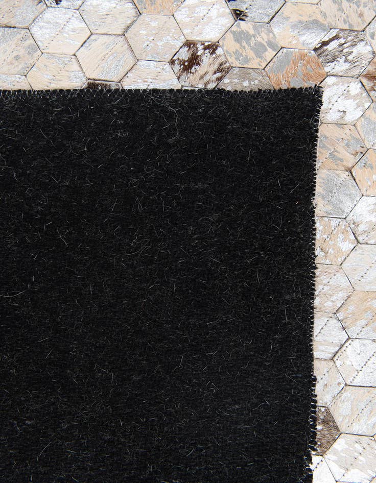 Detail image of  4' 1 x 5' 6 Cowhide Stocks Rug