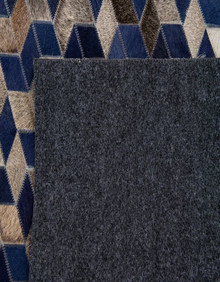 Detail image of  4' 4 x 6' 2 Cowhide Stocks Rug