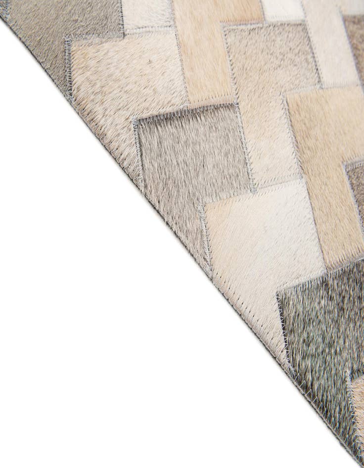Detail image of  4' 1 x 5' 11 Cowhide Stocks Rug