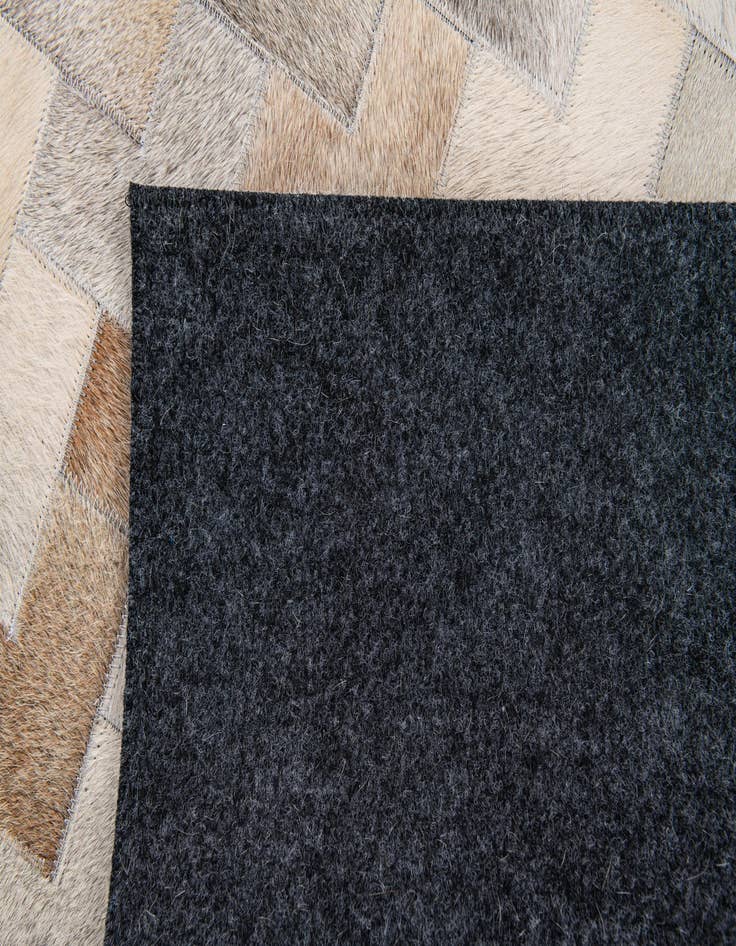 Detail image of  4' 1 x 5' 11 Cowhide Stocks Rug