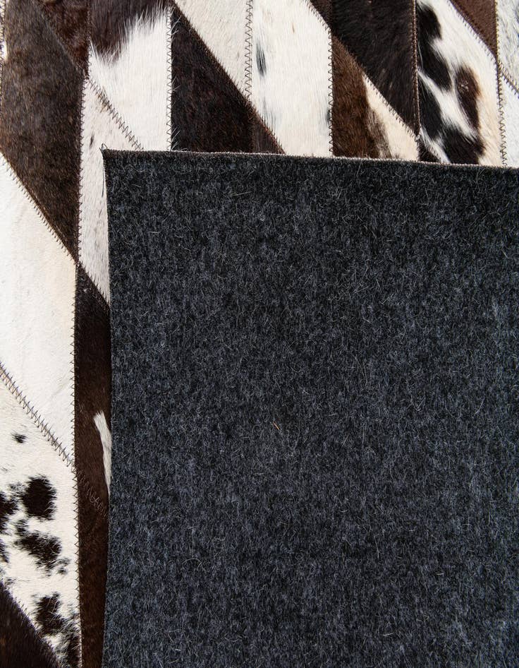 Detail image of  4' x 5' 11 Cowhide Stocks Rug