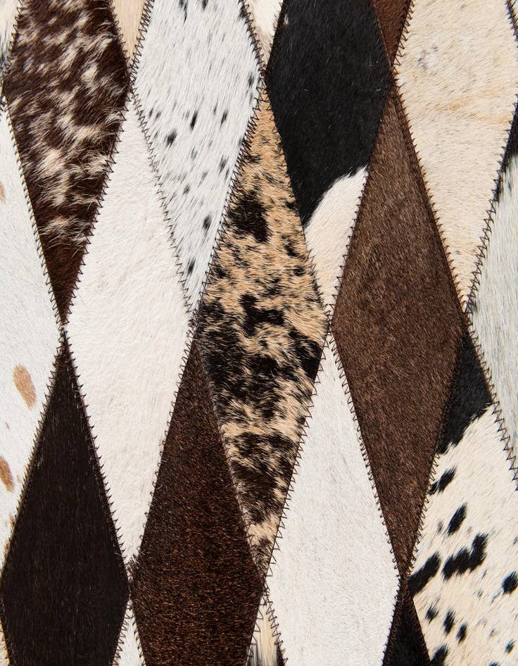 Detail image of  4' 1 x 5' 10 Cowhide Stocks Rug