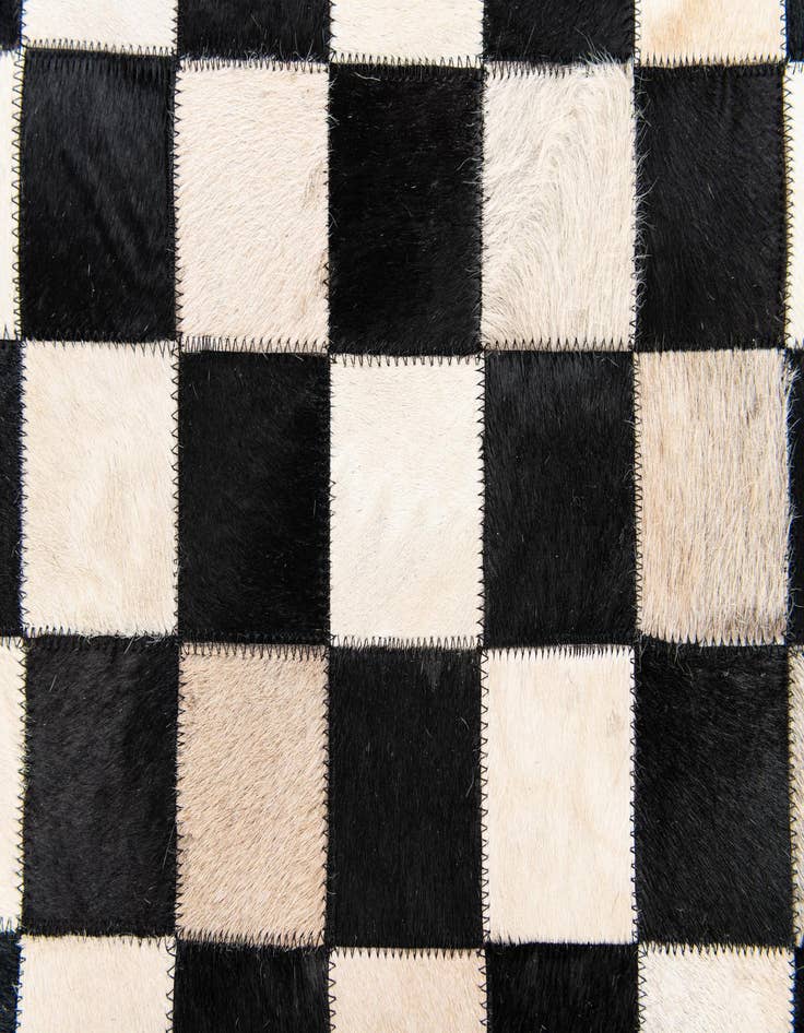 Detail image of  3' 11 x 5' 10 Cowhide Stocks Rug
