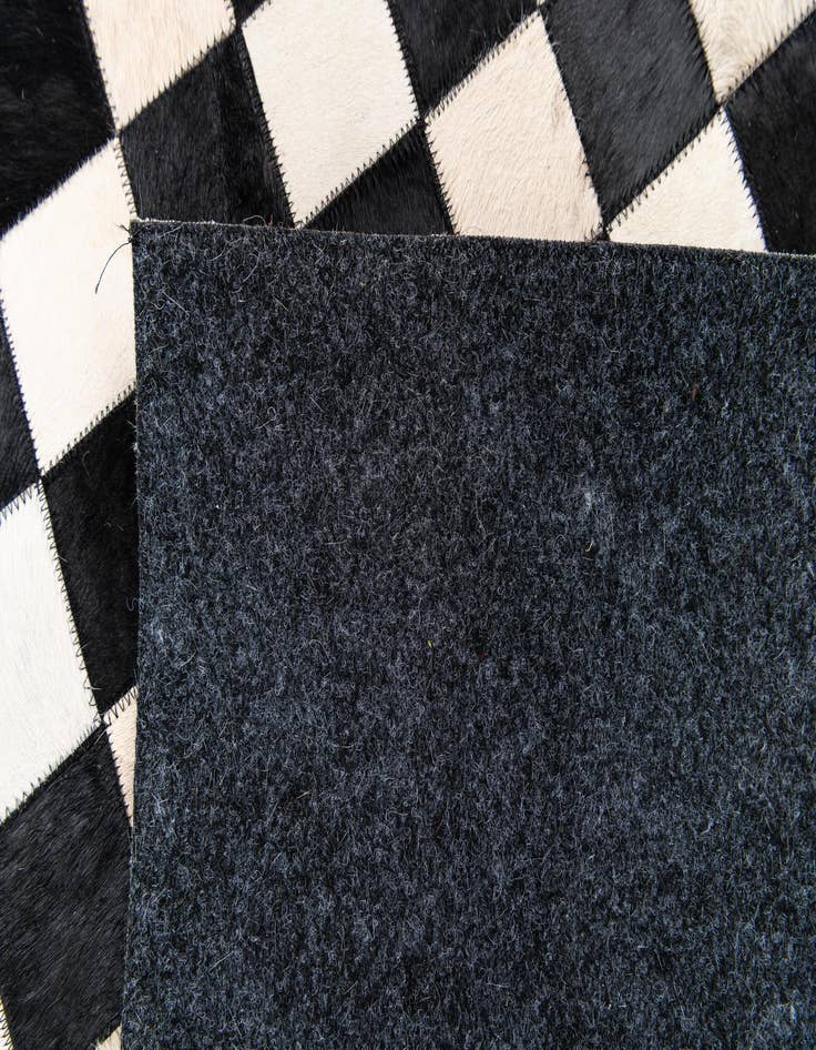 Detail image of  3' 11 x 5' 10 Cowhide Stocks Rug