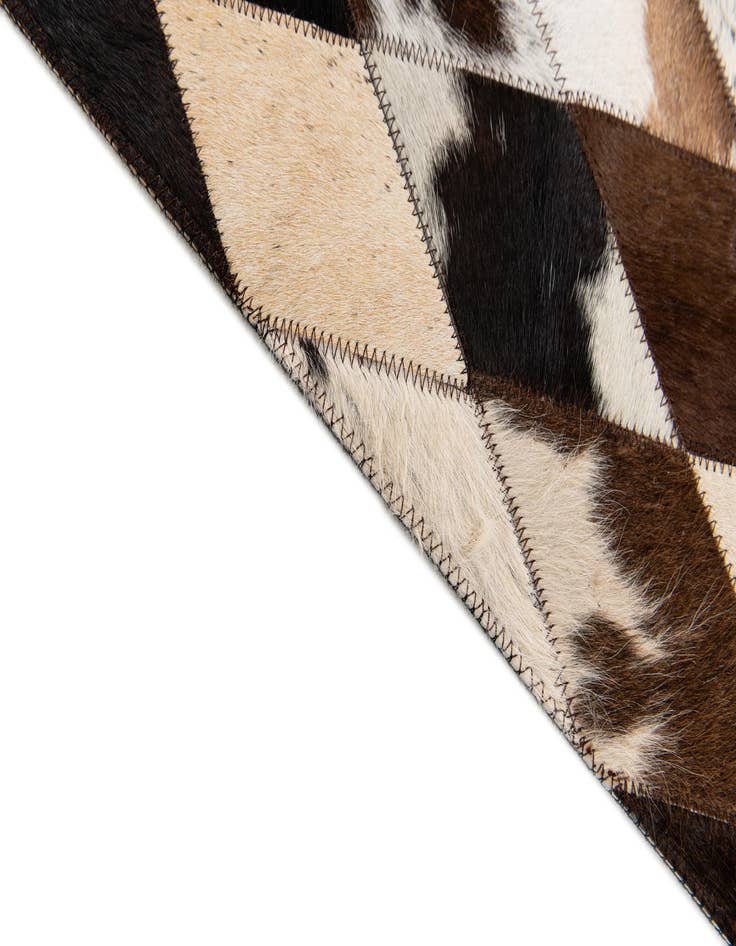 Detail image of  4' 1 x 5' 11 Cowhide Stocks Rug