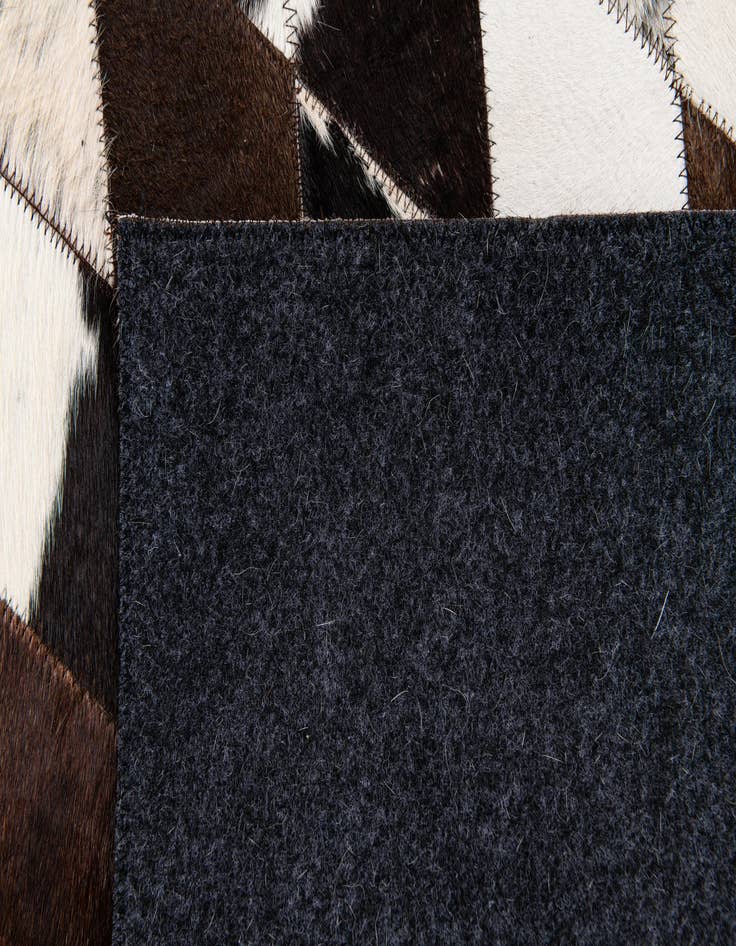 Detail image of  4' x 5' 11 Cowhide Stocks Rug