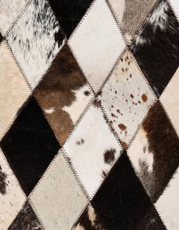 Detail image of  4' 1 x 5' 11 Cowhide Stocks Rug