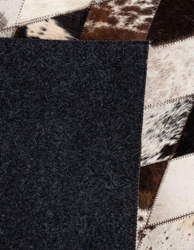 Detail image of  4' 1 x 5' 11 Cowhide Stocks Rug