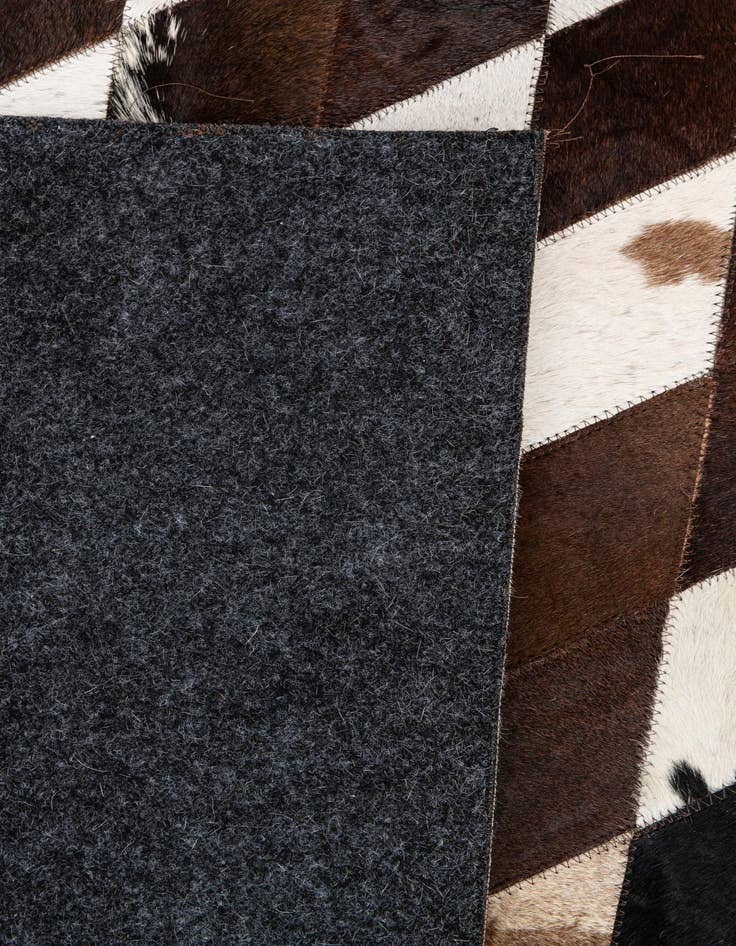Detail image of  4' x 5' 11 Cowhide Stocks Rug