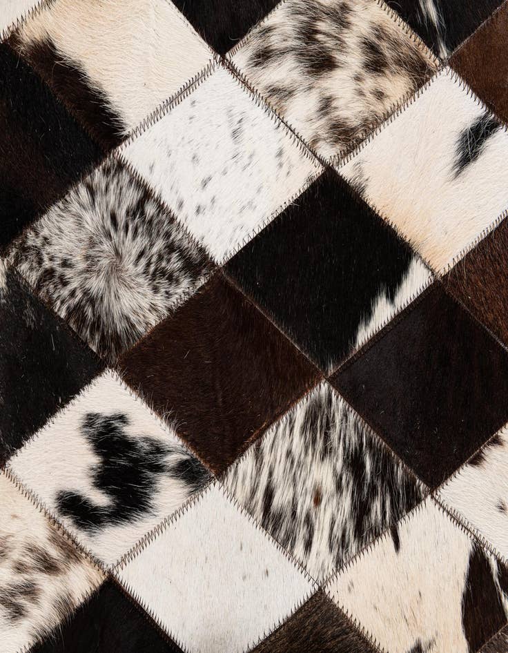 Detail image of  4' 1 x 5' 10 Cowhide Stocks Rug
