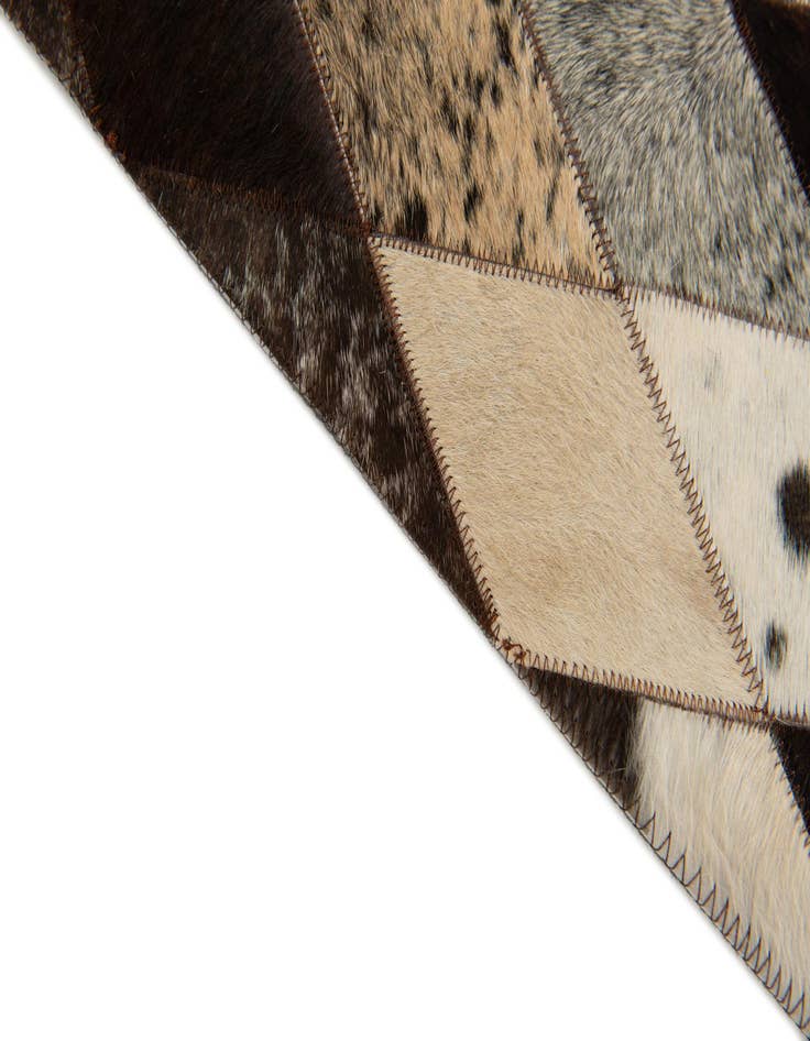 Detail image of  4' 1 x 5' 10 Cowhide Stocks Rug