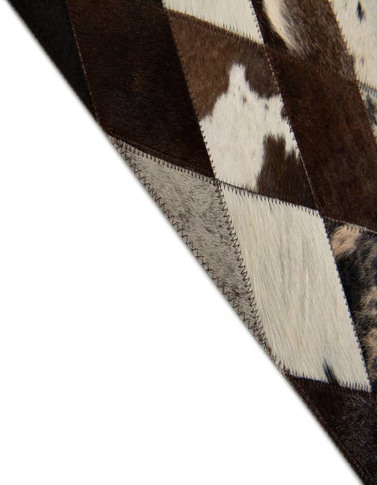 Detail image of  4' 1 x 5' 10 Cowhide Stocks Rug