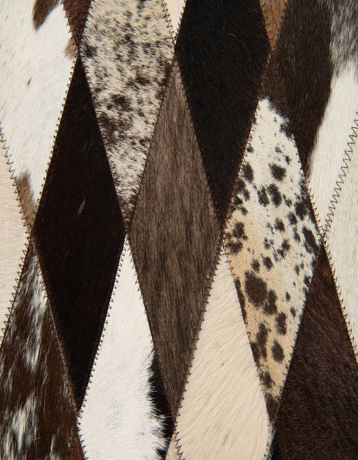 Detail image of  4' 1 x 5' 10 Cowhide Stocks Rug
