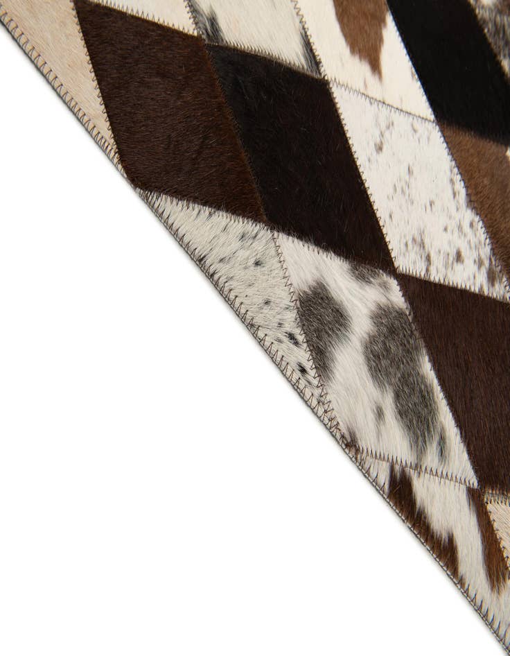 Detail image of  4' 1 x 5' 10 Cowhide Stocks Rug