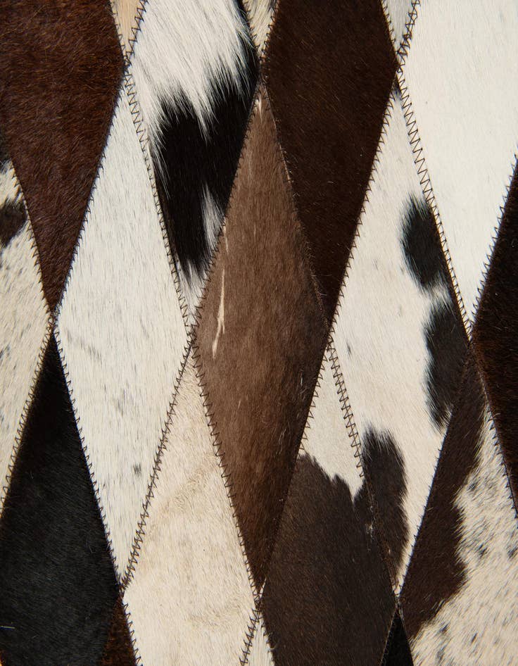 Detail image of  4' 1 x 5' 10 Cowhide Stocks Rug