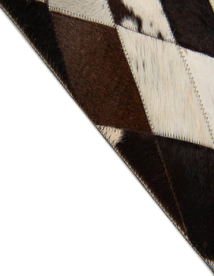Detail image of  4' 1 x 5' 10 Cowhide Stocks Rug
