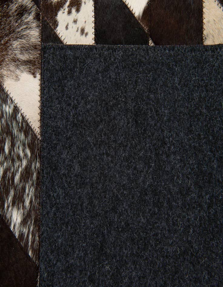 Detail image of  4' 1 x 5' 10 Cowhide Stocks Rug