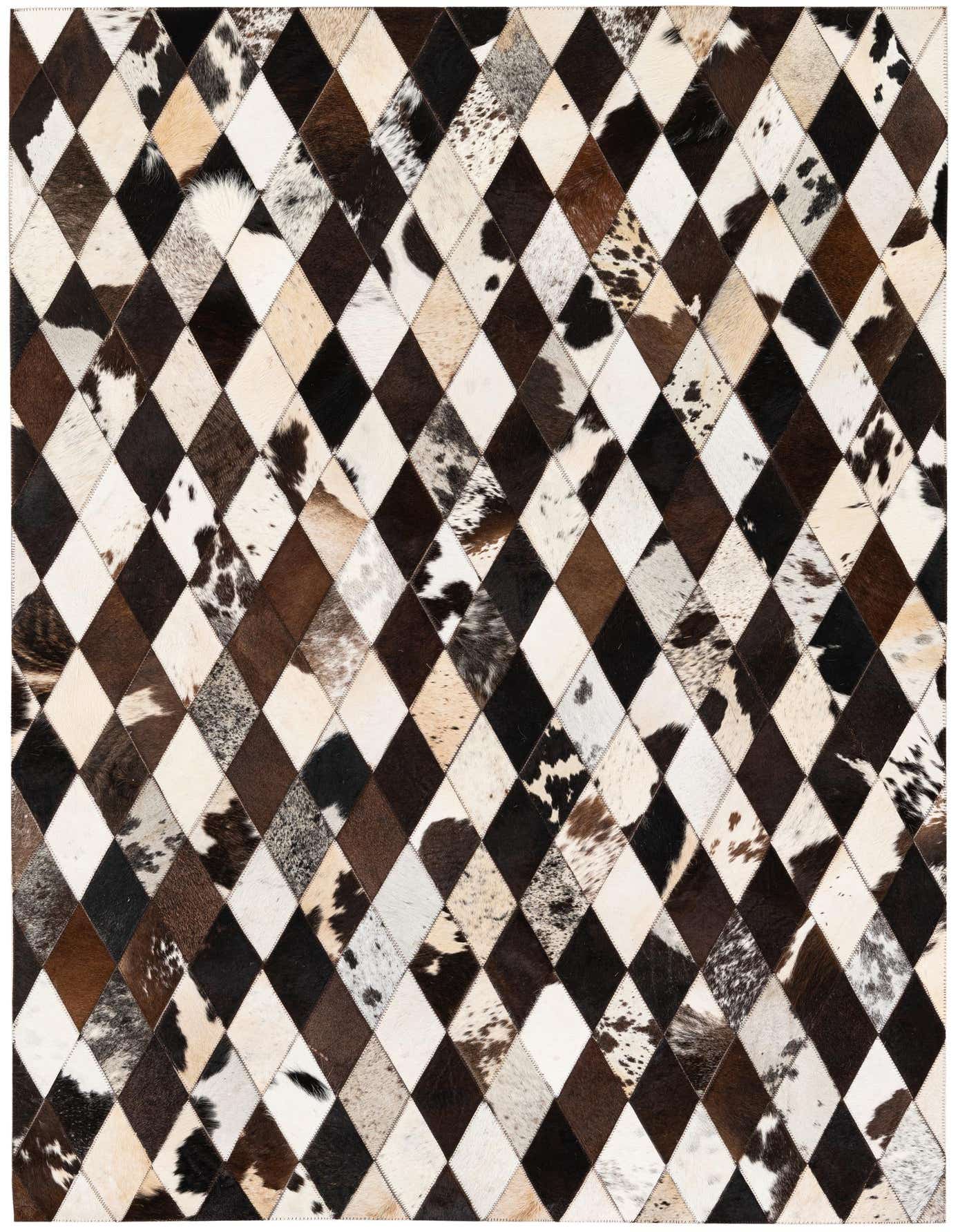 A rectangular 4x6 cowhide rug featuring a modern harlequin pattern of multi-colored diamond patches in various brown, black, and white tones.