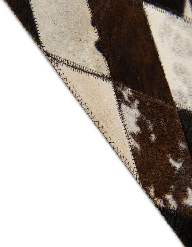 Detail image of  4' 1 x 5' 10 Cowhide Stocks Rug
