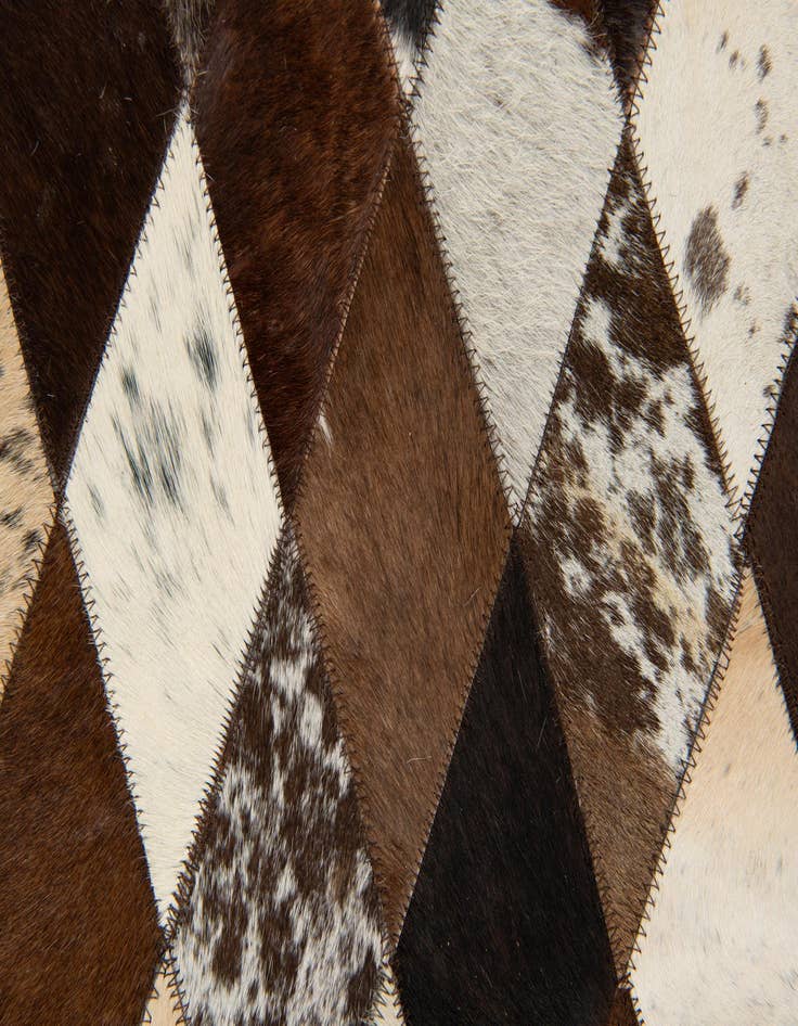 Detail image of  4' 1 x 5' 10 Cowhide Stocks Rug