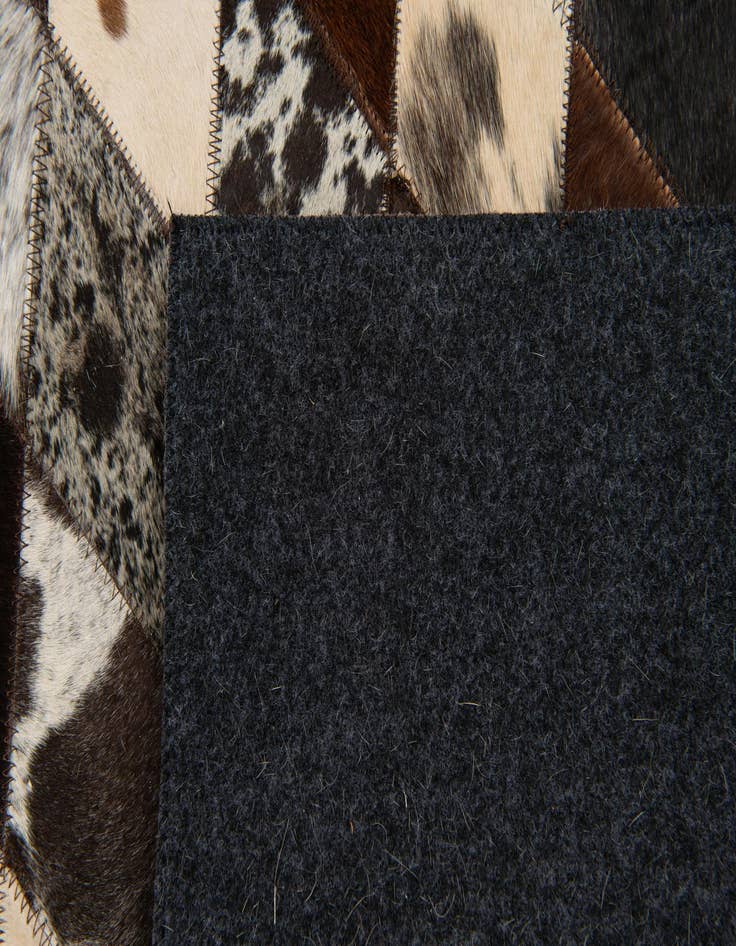 Detail image of  4' 1 x 5' 10 Cowhide Stocks Rug