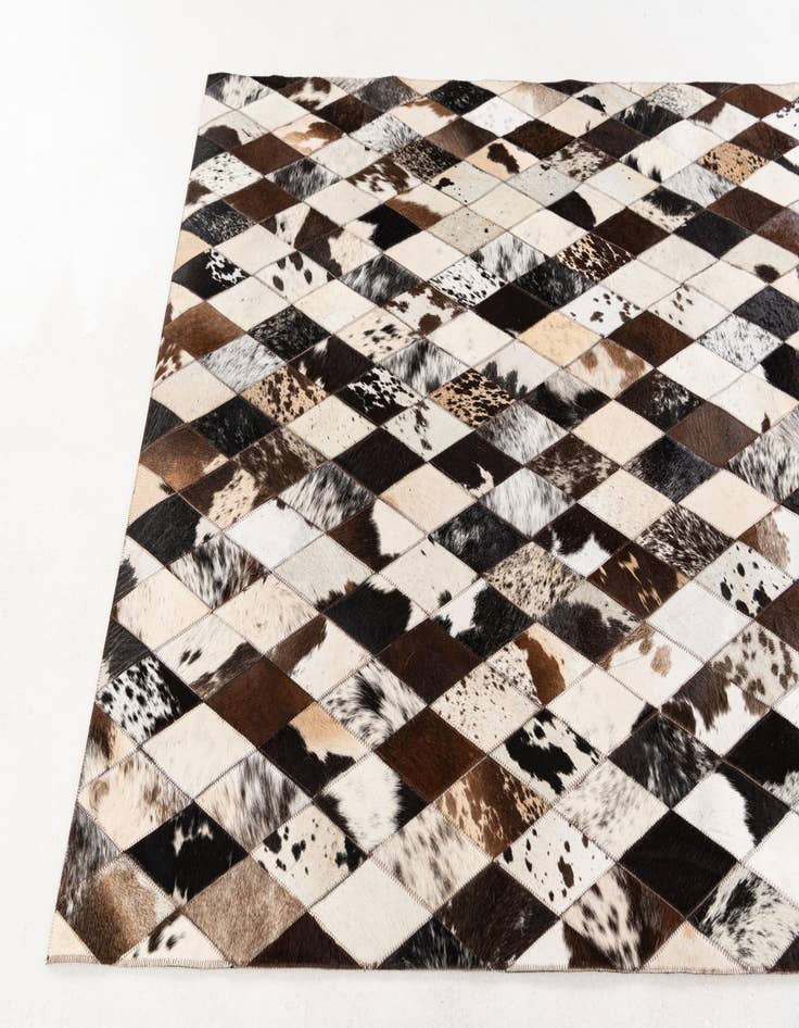 Detail image of  4' 1 x 5' 10 Cowhide Stocks Rug