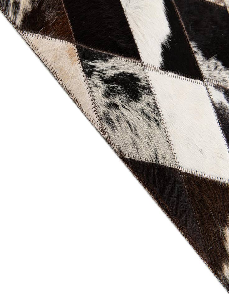 Detail image of  4' 1 x 5' 10 Cowhide Stocks Rug