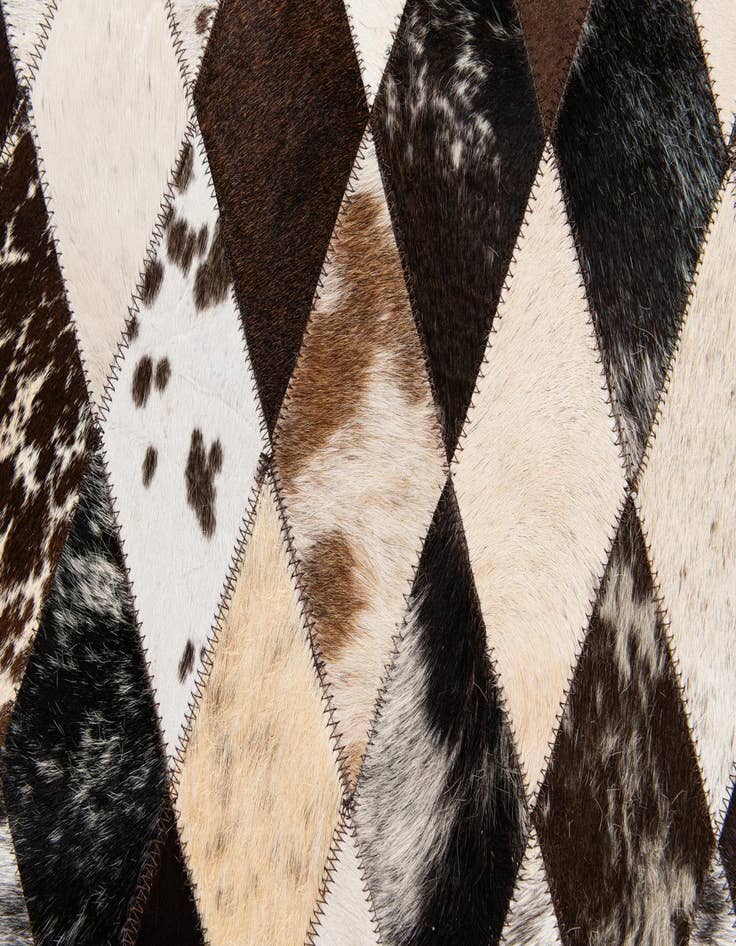 Detail image of  4' 1 x 5' 10 Cowhide Stocks Rug
