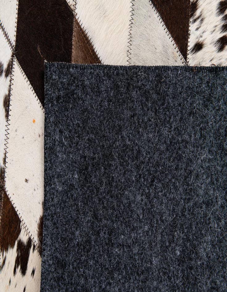 Detail image of  4' x 5' 10 Cowhide Stocks Rug