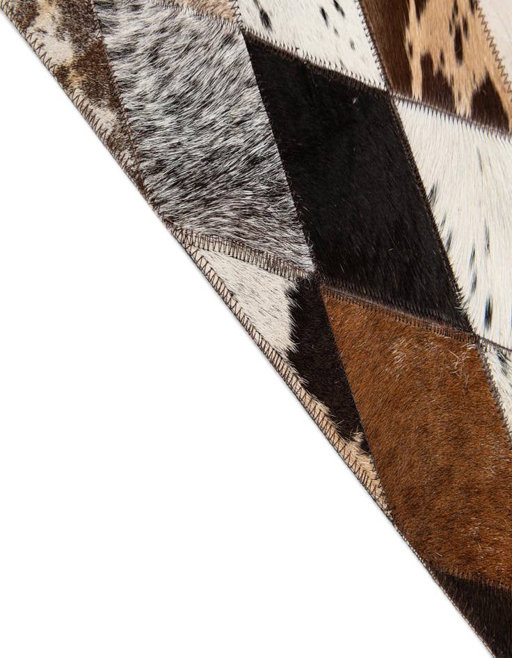 Detail image of  4' 1 x 5' 11 Cowhide Stocks Rug