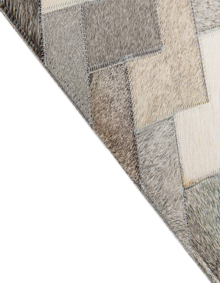 Detail image of  4' 1 x 5' 11 Cowhide Stocks Rug