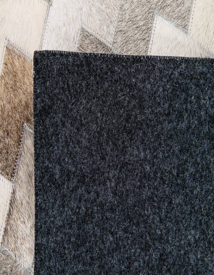 Detail image of  4' 1 x 5' 11 Cowhide Stocks Rug