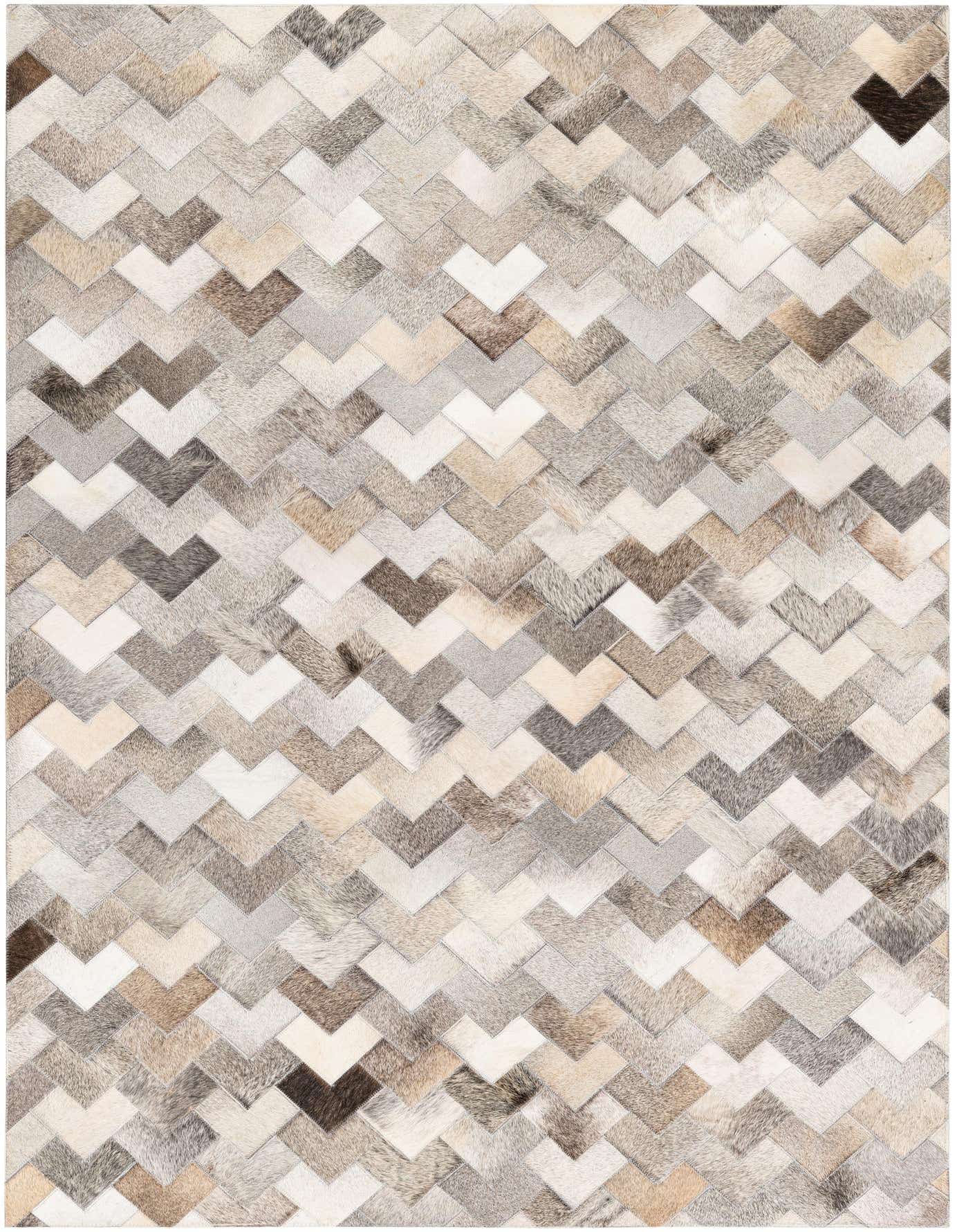 A 4x6 rectangular rug featuring a modern chevron pattern made from multi-colored cowhide and leather patches.