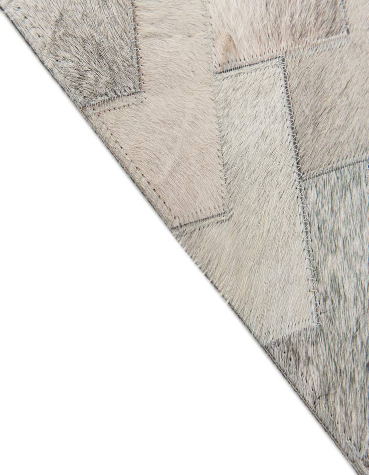 Detail image of  4' 1 x 5' 11 Cowhide Stocks Rug