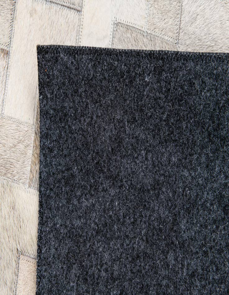Detail image of  4' 1 x 5' 11 Cowhide Stocks Rug