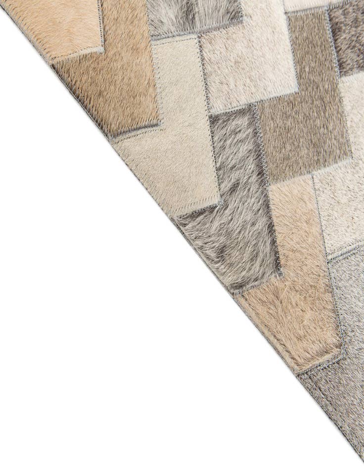 Detail image of  4' 1 x 5' 11 Cowhide Stocks Rug