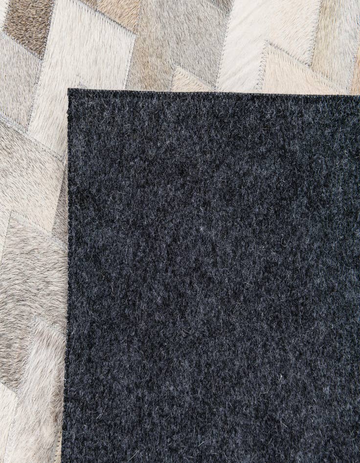 Detail image of  4' 1 x 5' 11 Cowhide Stocks Rug